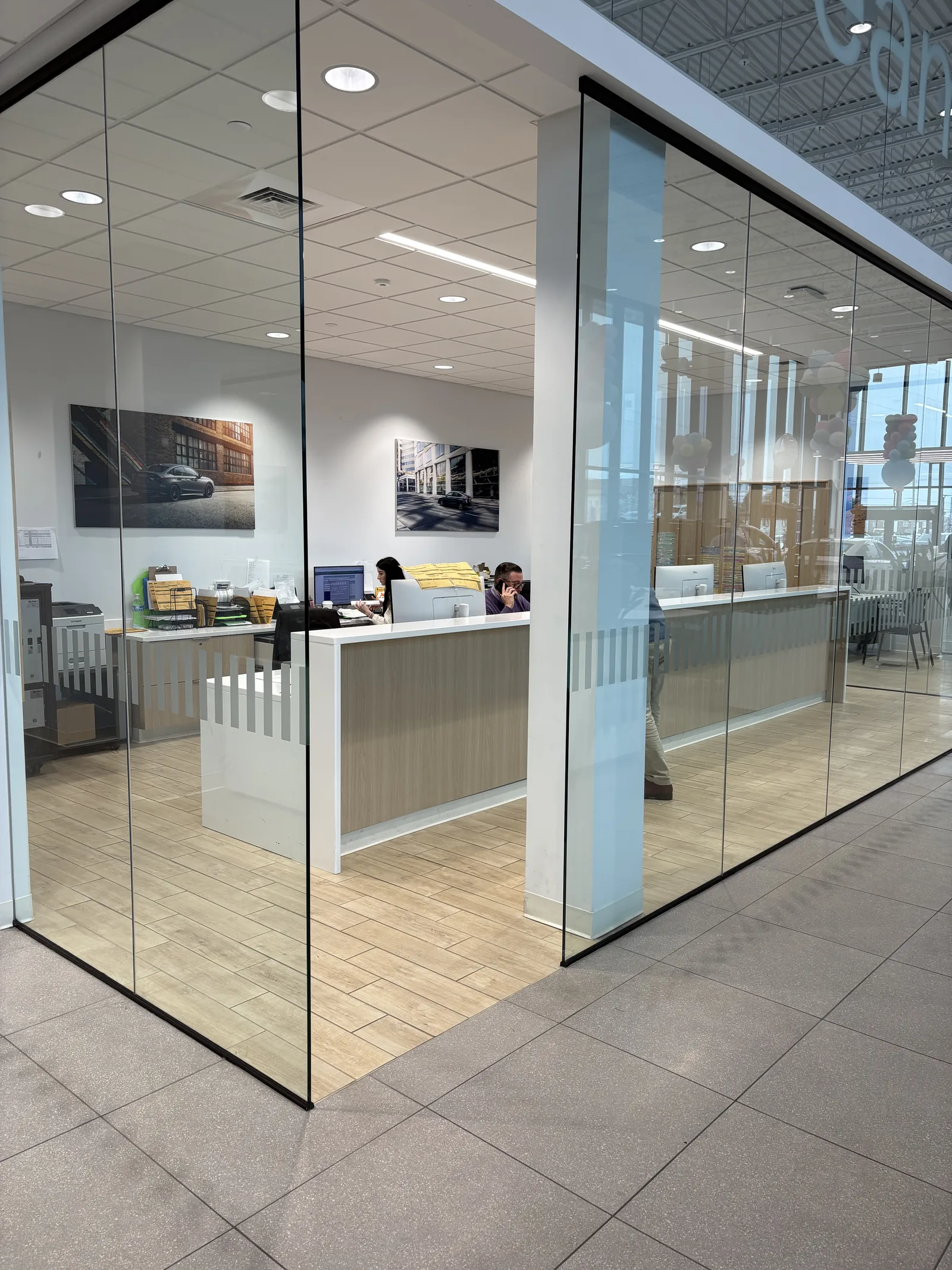 A real Corporate Window Films install with an awareness band on full-height office glass