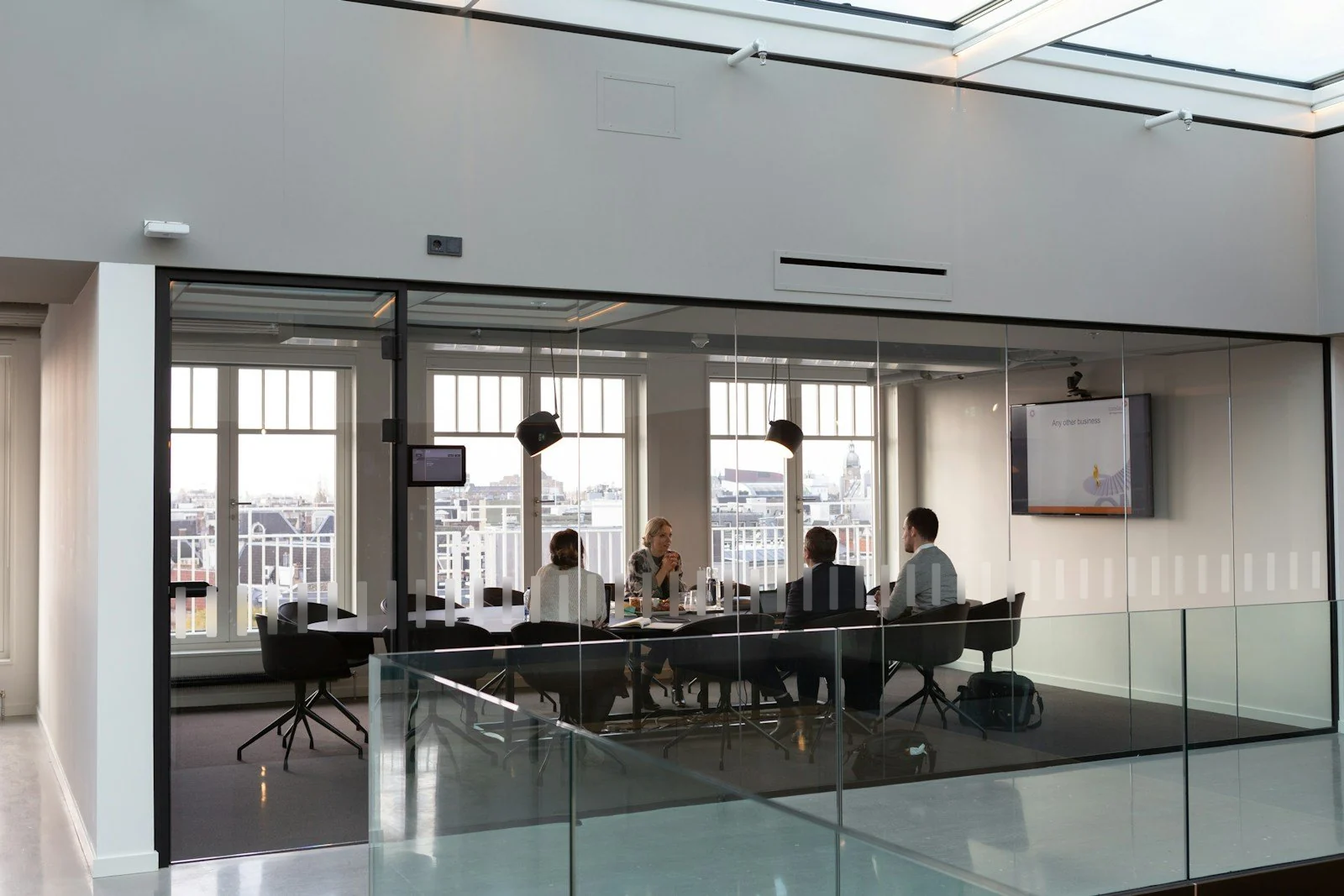 Same office glass with awareness film vertical bands applied at eye level