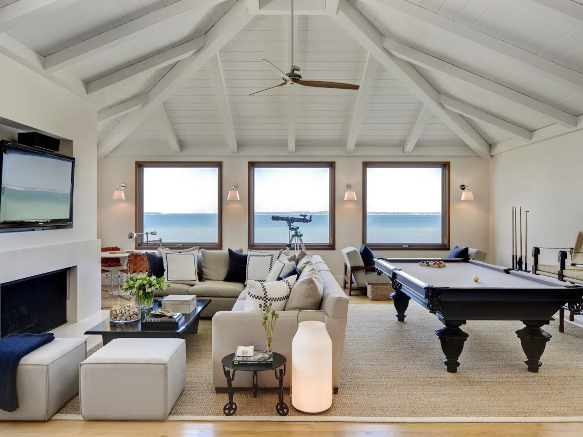 Bright living room with large windows and hardwood floors